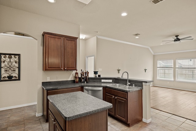 3305 Francis Dr, Wylie, TX 75098 - kitchen featuring stainless steel dishwasher, a sink, crown molding, ceiling fan, and a peninsula