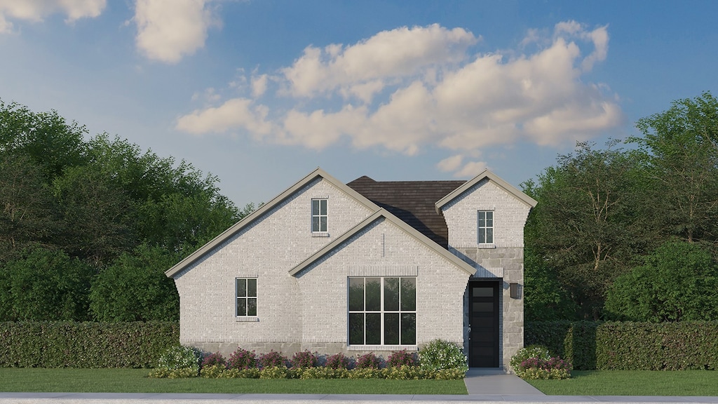 1717 Truro Ln, Fort Worth, TX 76052 - view of front facade featuring a front lawn, brick siding, and stone siding