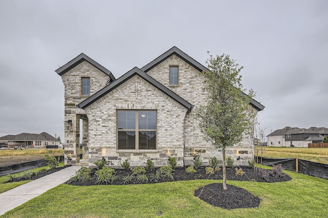 1717 Truro Ln, Fort Worth, TX 76052 - french provincial home featuring a front lawn and stone siding