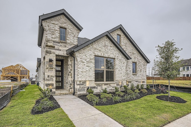 1717 Truro Ln, Fort Worth, TX 76052 - french country inspired facade featuring stone siding