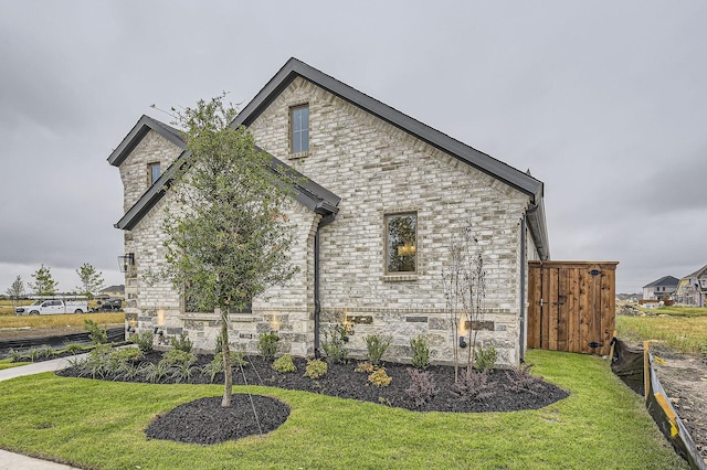 1717 Truro Ln, Fort Worth, TX 76052 - view of side of property featuring stone siding