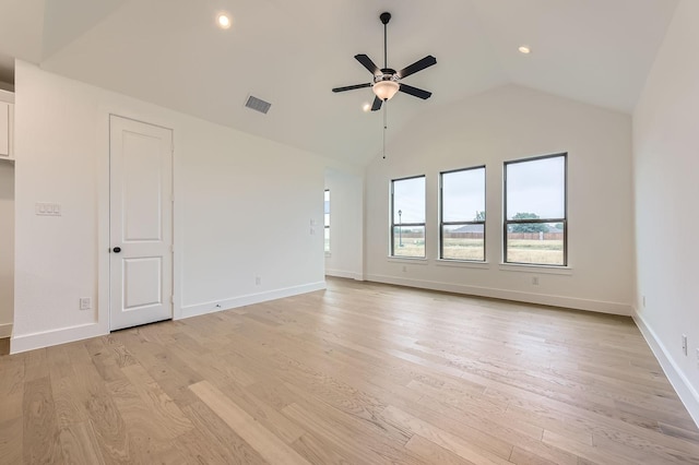1717 Truro Ln, Fort Worth, TX 76052 - empty room with a ceiling fan, vaulted ceiling, light wood finished floors, recessed lighting, and baseboards