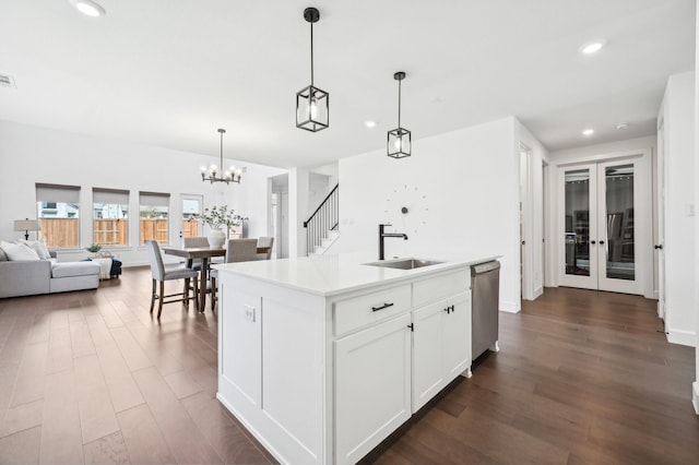 4190 Holland Ct, Prosper, TX 75078 - kitchen with dishwasher, recessed lighting, open floor plan, a sink, and dark wood-style floors