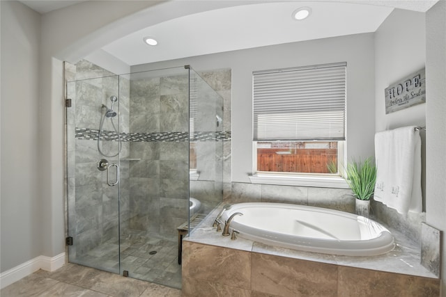full bath featuring a bath, a shower stall, tile patterned flooring, recessed lighting, and baseboards