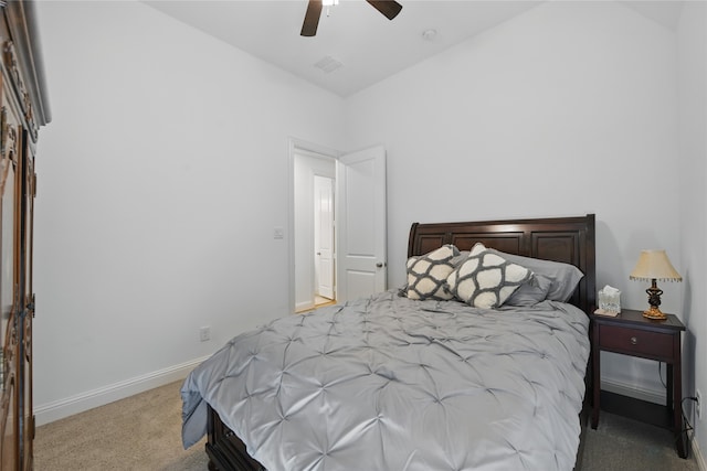 bedroom featuring carpet floors, baseboards, and ceiling fan
