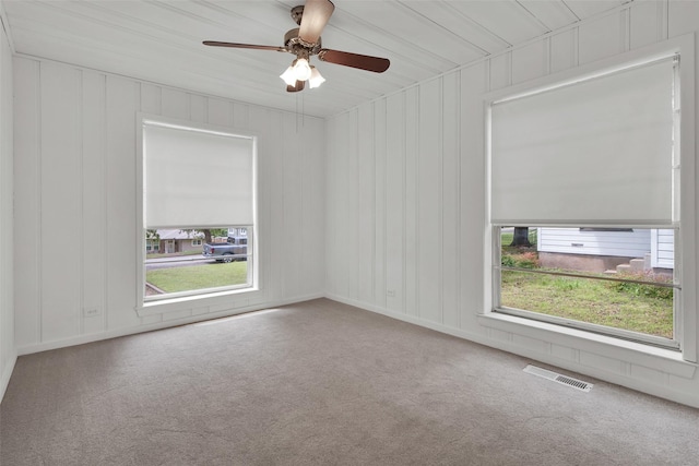 1501 W Day St, Denison, TX 75020 - unfurnished room with plenty of natural light, carpet floors, and ceiling fan