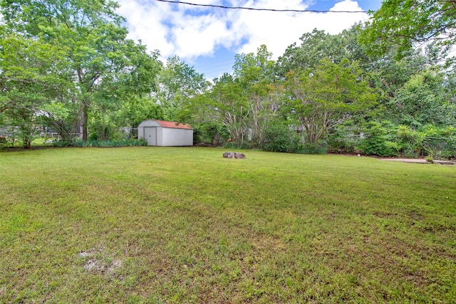1501 W Day St, Denison, TX 75020 - view of yard featuring a storage shed and an outdoor structure