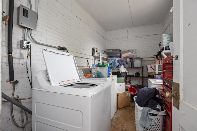 washroom with washing machine and clothes dryer