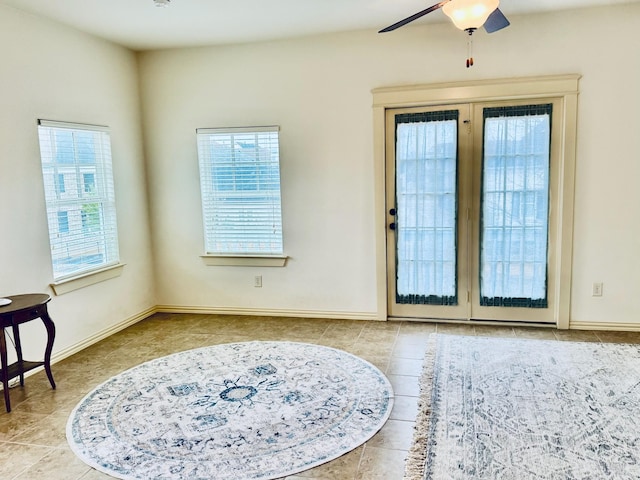 7501 Darrow Dr, Mckinney, TX 75071 - entryway with healthy amount of natural light, ceiling fan, tile patterned flooring, and baseboards
