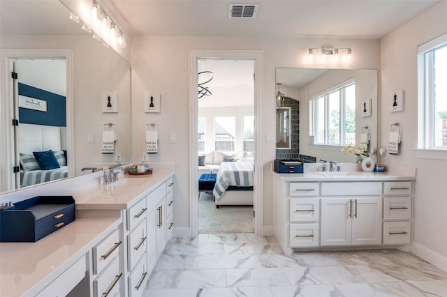 3228 Saddle Brook Rd, Celina, TX 75009 - bathroom with ensuite bathroom, marble finish floors, and two vanities
