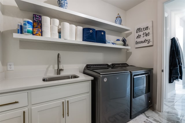 3228 Saddle Brook Rd, Celina, TX 75009 - washroom with washing machine and dryer, light marble finish floors, and cabinet space