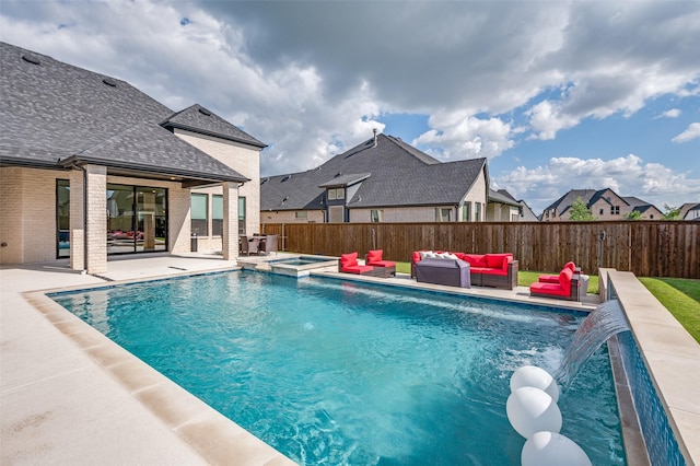 3228 Saddle Brook Rd, Celina, TX 75009 - view of swimming pool featuring an outdoor living space, a patio area, a fenced backyard, and a pool with connected hot tub