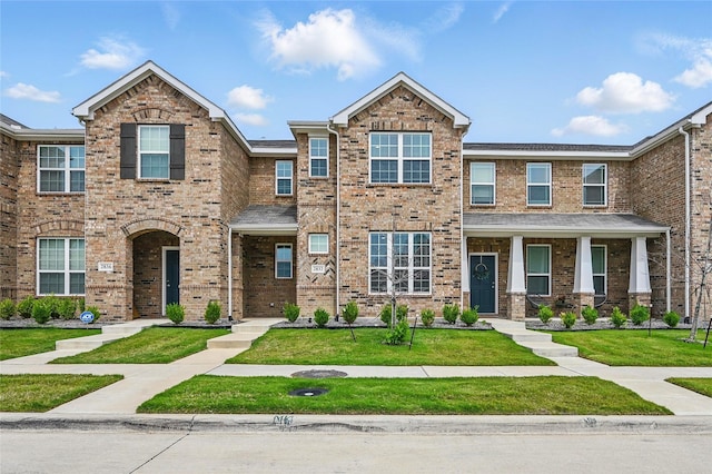 2832 Baneberry Ln, Mesquite, TX 75150 - view of property with a front lawn and brick siding