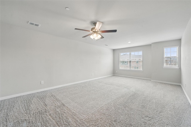 2832 Baneberry Ln, Mesquite, TX 75150 - carpeted spare room featuring ceiling fan and baseboards