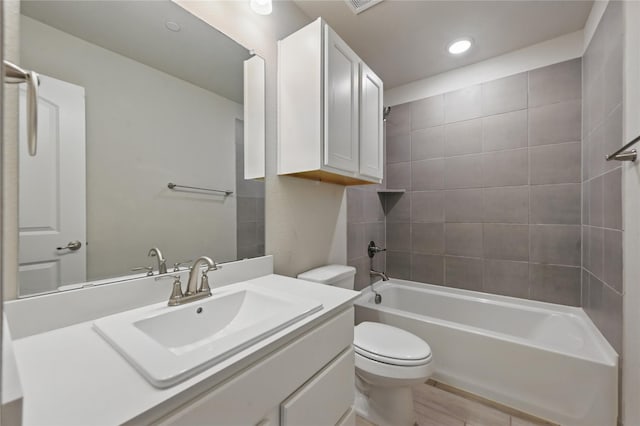 2832 Baneberry Ln, Mesquite, TX 75150 - bathroom with toilet, vanity,  shower combination, and recessed lighting