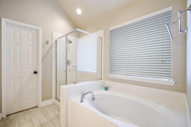 9121 Rio Blanco Dr, Frisco, TX 75033 - bathroom with a stall shower, a bath, and lofted ceiling