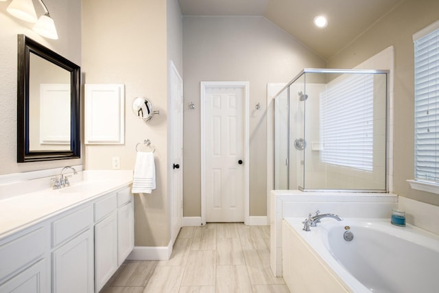 9121 Rio Blanco Dr, Frisco, TX 75033 - full bath with a stall shower, a garden tub, vanity, vaulted ceiling, and baseboards