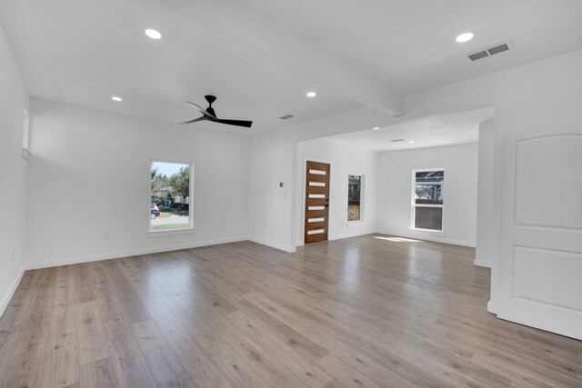 921 Hollywood Ave, Dallas, TX 75208 - unfurnished living room with healthy amount of natural light, light wood finished floors, recessed lighting, ceiling fan, and baseboards