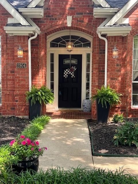 2904 Branch Hollow Cir, Flower Mound, TX 75028 - property entrance with brick siding