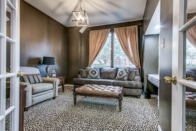 2904 Branch Hollow Cir, Flower Mound, TX 75028 - living room featuring a chandelier, carpet flooring, and baseboards