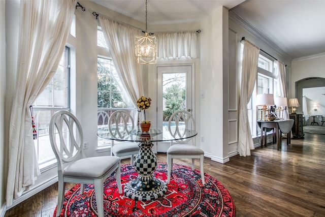 2904 Branch Hollow Cir, Flower Mound, TX 75028 - dining space featuring a chandelier, dark wood-style flooring, crown molding, and baseboards