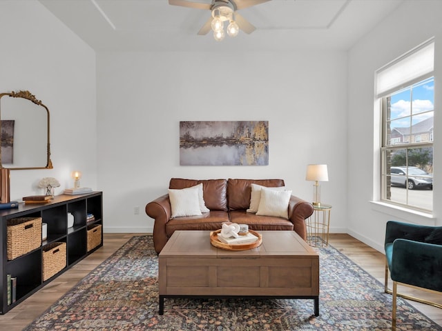 4508 English Maple Dr, Arlington, TX 76005 - living area featuring light wood-style floors, ceiling fan, and baseboards