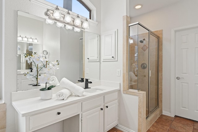2445 Sky Harbor Dr, Plano, TX 75025 - bathroom with a stall shower and vanity