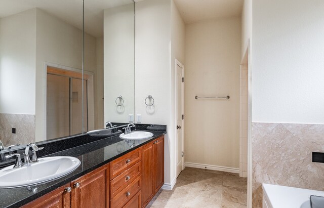 13900 Noel Rd Unit 2, Dallas, TX 75240 - bathroom with double vanity