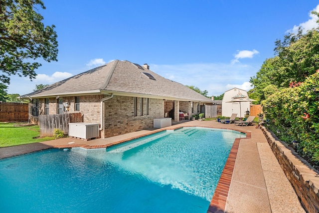 508 Quail Crest Dr, Colleyville, TX 76034 - view of swimming pool with a fenced backyard, a storage shed, an outdoor structure, and a patio