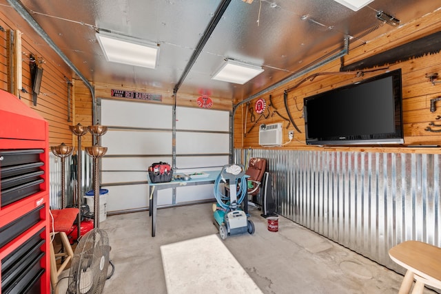 508 Quail Crest Dr, Colleyville, TX 76034 - garage with wood walls and an AC wall unit