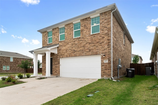 1802 Marquette Rd, Princeton, TX 75407 - view of front of home featuring an attached garage, brick siding, driveway, and central AC unit
