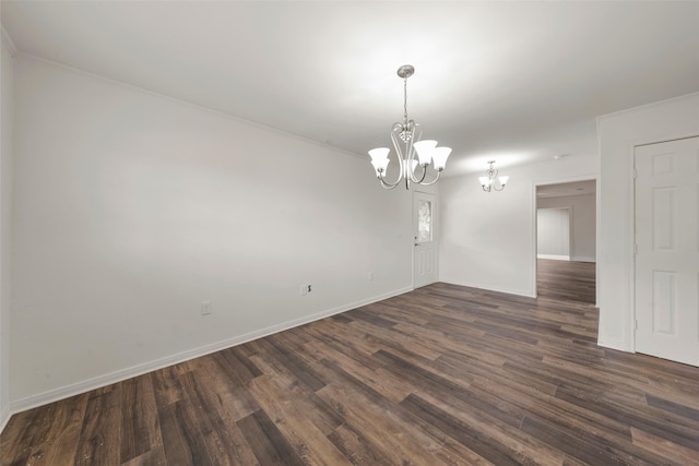 121 Faye St, Lacy Lakeview, TX 76705 - empty room featuring a chandelier, dark wood-style flooring, baseboards, and ornamental molding