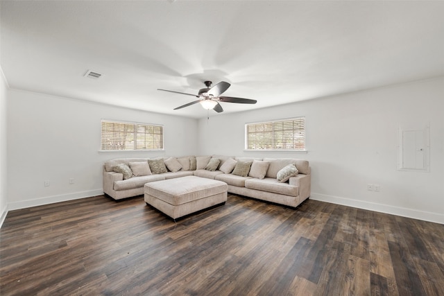 121 Faye St, Lacy Lakeview, TX 76705 - living area featuring plenty of natural light, a ceiling fan, baseboards, and dark wood finished floors