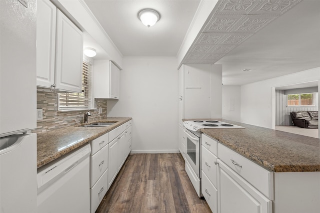 121 Faye St, Lacy Lakeview, TX 76705 - kitchen featuring white appliances, a sink, dark wood-style flooring, backsplash, and white cabinets