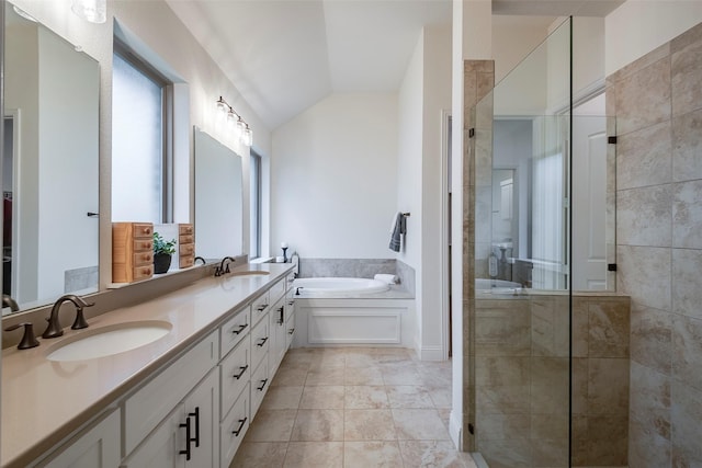 14601 Donner Trl, Fort Worth, TX 76262 - full bath featuring a stall shower, lofted ceiling, a garden tub, and double vanity