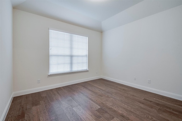 14601 Donner Trl, Fort Worth, TX 76262 - unfurnished room featuring dark wood finished floors, baseboards, and lofted ceiling