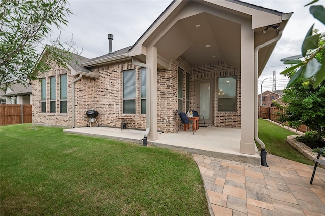 14601 Donner Trl, Fort Worth, TX 76262 - back of house featuring a patio area and brick siding