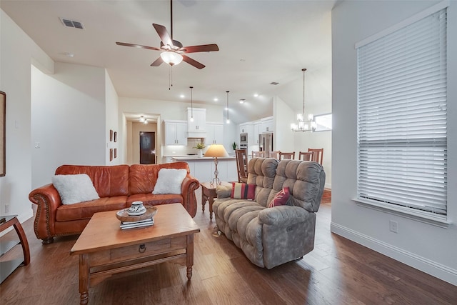 14601 Donner Trl, Fort Worth, TX 76262 - living room featuring ceiling fan, dark wood finished floors, vaulted ceiling, a chandelier, and baseboards