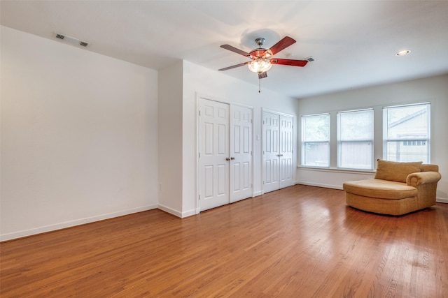5322 Stoneleigh Ave, Dallas, TX 75235 - sitting room featuring light wood-style floors, baseboards, a ceiling fan, and recessed lighting