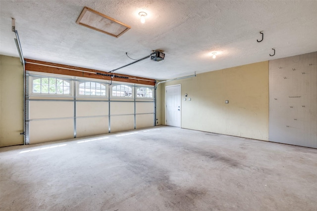 5322 Stoneleigh Ave, Dallas, TX 75235 - garage featuring a garage door opener