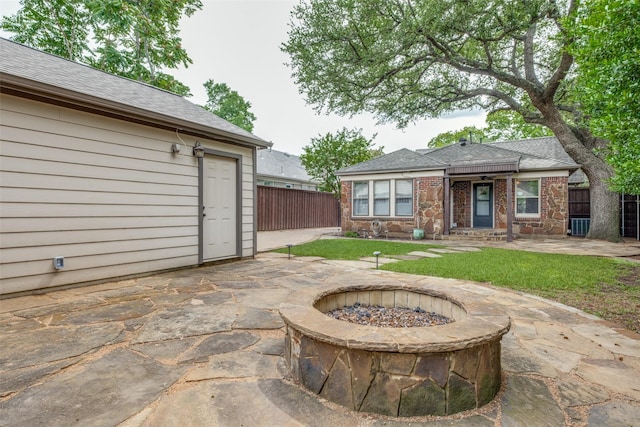 5322 Stoneleigh Ave, Dallas, TX 75235 - view of patio with an outdoor fire pit