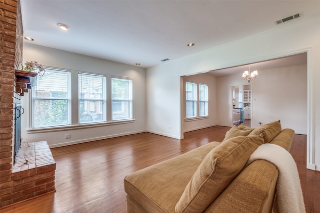5322 Stoneleigh Ave, Dallas, TX 75235 - living area featuring a chandelier, wood finished floors, a fireplace, baseboards, and recessed lighting