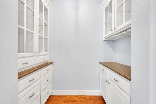 3706 Plum Vista Pl, Arlington, TX 76005 - bar featuring light wood finished floors and baseboards