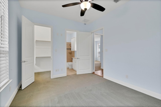 3706 Plum Vista Pl, Arlington, TX 76005 - unfurnished bedroom with a walk in closet, carpet floors, a closet, and baseboards
