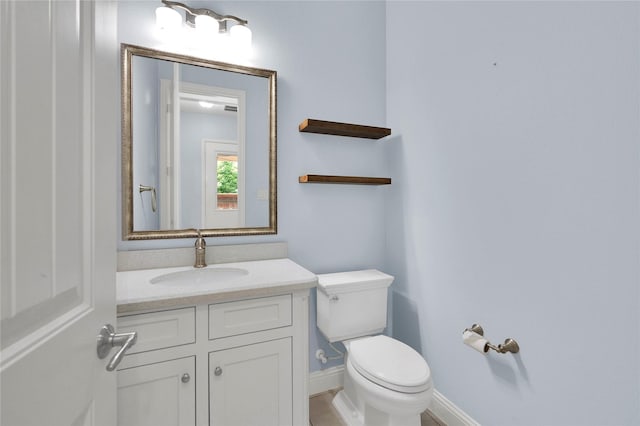 3706 Plum Vista Pl, Arlington, TX 76005 - half bath featuring toilet, vanity, and baseboards