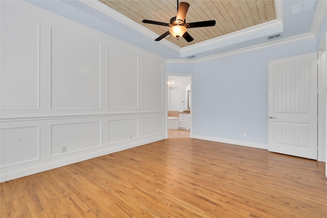 3706 Plum Vista Pl, Arlington, TX 76005 - empty room with a tray ceiling, light wood-style flooring, a ceiling fan, wooden ceiling, and ornamental molding