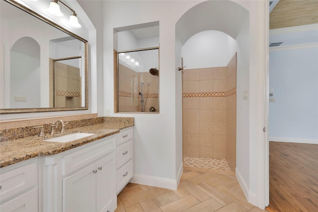 3706 Plum Vista Pl, Arlington, TX 76005 - bathroom with walk in shower, vanity, and baseboards