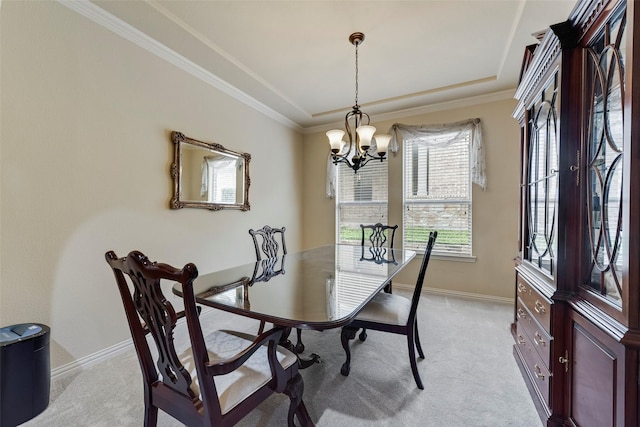 7817 Harvest Hill Ln, Mckinney, TX 75071 - dining room with a chandelier, light colored carpet, baseboards, and crown molding