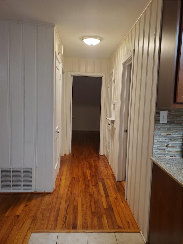 1600 N Frances St, Terrell, TX 75160 - hallway with light wood-style flooring