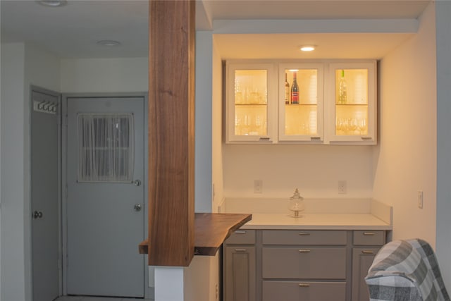 kitchen featuring gray cabinetry and light countertops